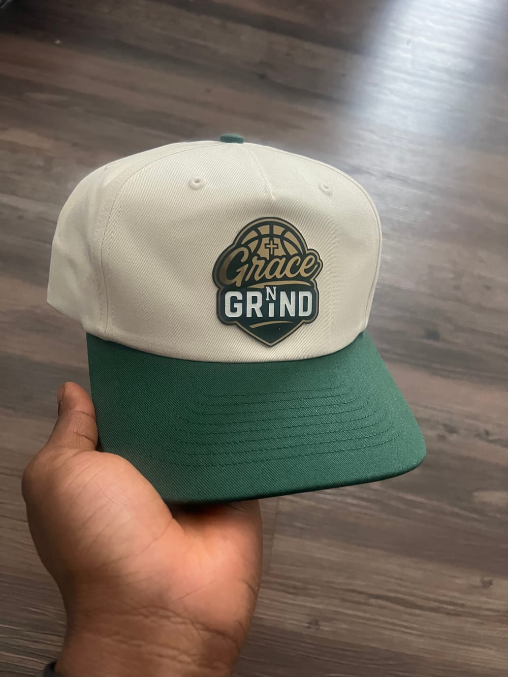 Grace N Grind cream and green snapback hat